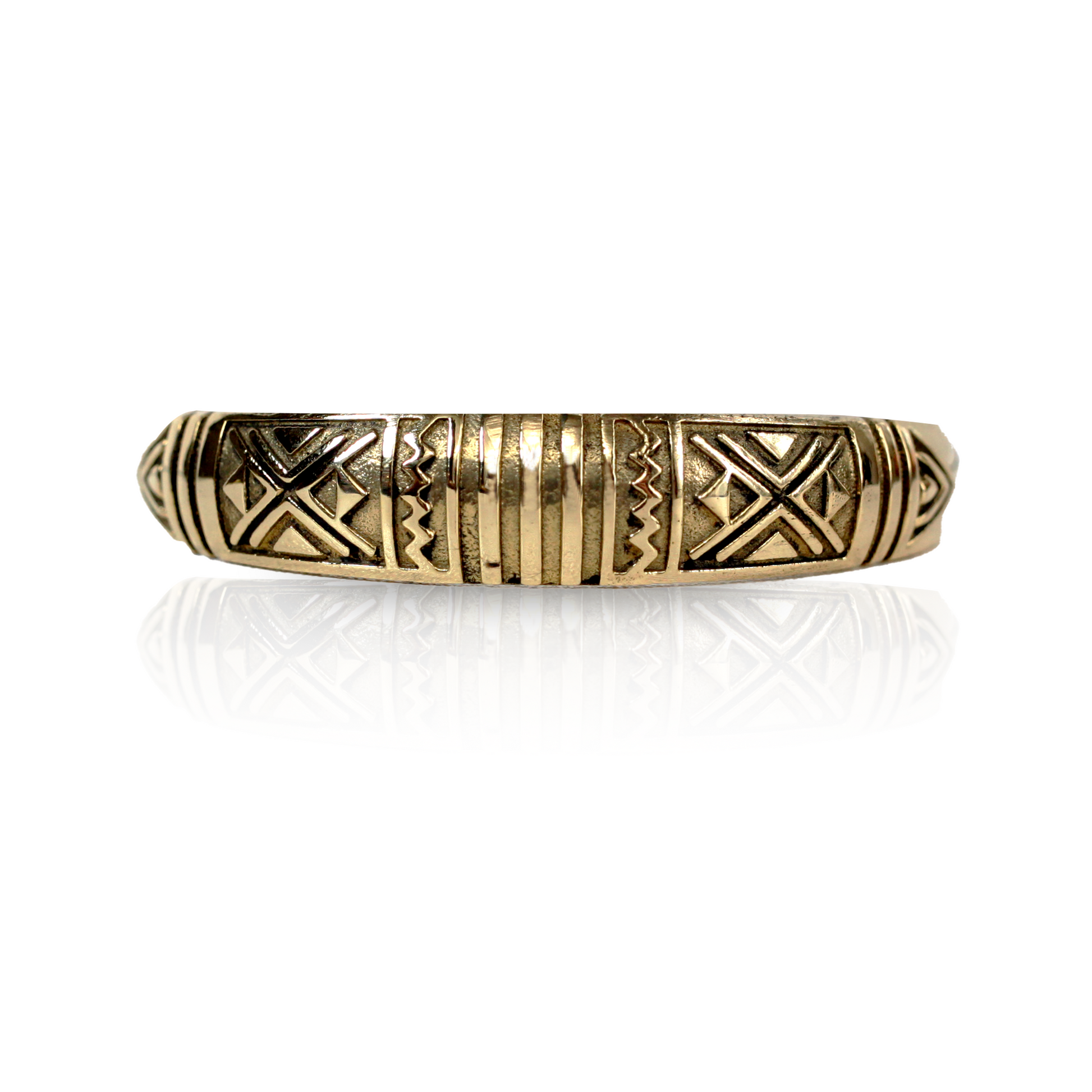 Brass cuff bracelet with tribal designs etched into the bracelet. 
